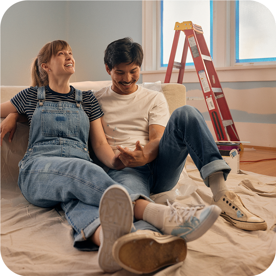 Couple working on a home renovation funded with savings account